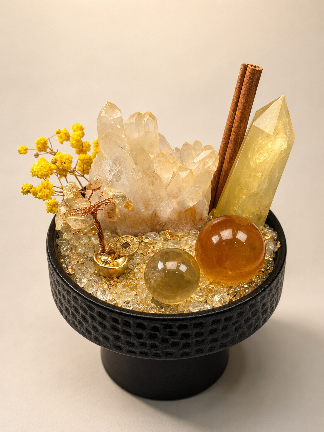 Golden citrine crystal desktop garden with cinnamon and dried yellow flowers